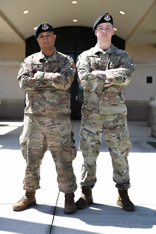 U.S. Air Force Tech. Sgt. Urich Garcia and U.S. Air Force Staff Sgt. Brian Hardy, 45th Security Forces Squadron supra coders, stand outside the 45th SFS building at Patrick Space Force Base, Fla., April 25, 2022. Supra coders are Airmen and Guardians who perform duties developing, managing, and designing software for the United States Space Force.