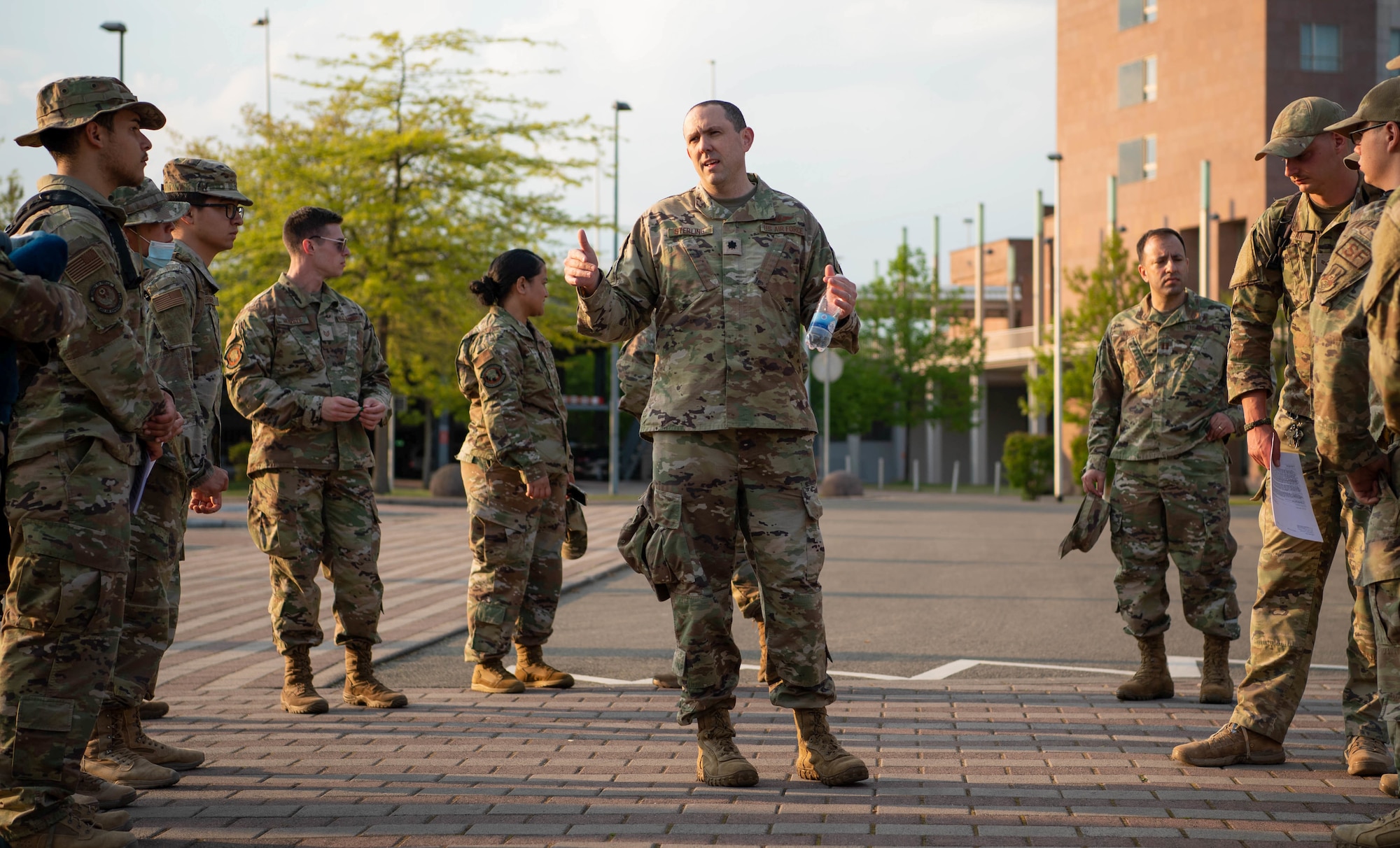 U.S. Air Force Lt. Col. Kenneth Sterling, 86th Mission Support Squadron Detachment 1 Deployment Transition Center commander, greets and reviews safety procedures for the redeployers at Ramstein Air Base, Germany, May 3, 2022.