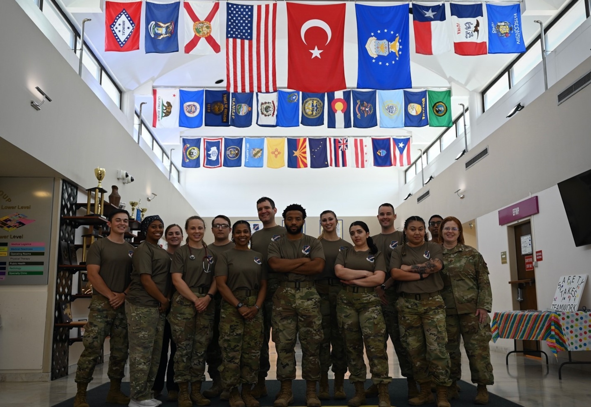 Medical personnel from various sections of the 39th Medical Group gather for a group photo in honor of National Nurse and Medical Technician Week at Incirlik Air Base, May 6, 2022. National Nurses and Medical Technicians Week occurs annually from May 6-12 and provides an opportunity to recognize members serving in these professions and cultivate a sense of community appreciation for their work. (U.S. Air Force photo by Staff Sgt. Gabrielle Winn)
