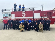 Students from Smith Vocational and Agricultural High School tour the 104th Fighting Wing May 6, 2022, at Barnes Air National Guard Base, Massachusetts.   The students visited the Fire Department, Security Forces Squadron, and the Logistics Readiness Squadron.  The 104FW public affairs team has an annual base tour program April - October open to community youth groups and local employers to strengthen partnerships.  (U.S Air National Guard Photos by Master Sgt. Lindsey S. Watson)