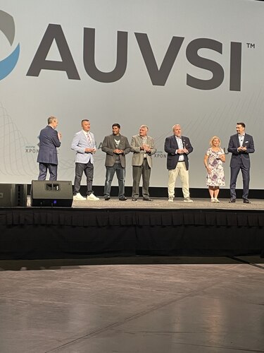 AFWERX’s Darshan Divakaran is recognized as AUVSI's Chapter Leader of the Year for his role as the founder and president of the AUVSI North Carolina branch at AUVSI XPONENTIAL 2022, an advanced air mobility convention in Orlando, Fla., April 28, 2022. (U.S. Air Force photo / Ciska Bloemhard)