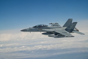 U.S. Navy fighter jets flying.