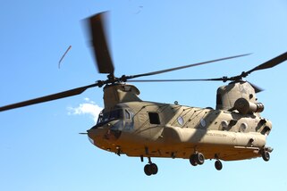 A military helicopter in flight.