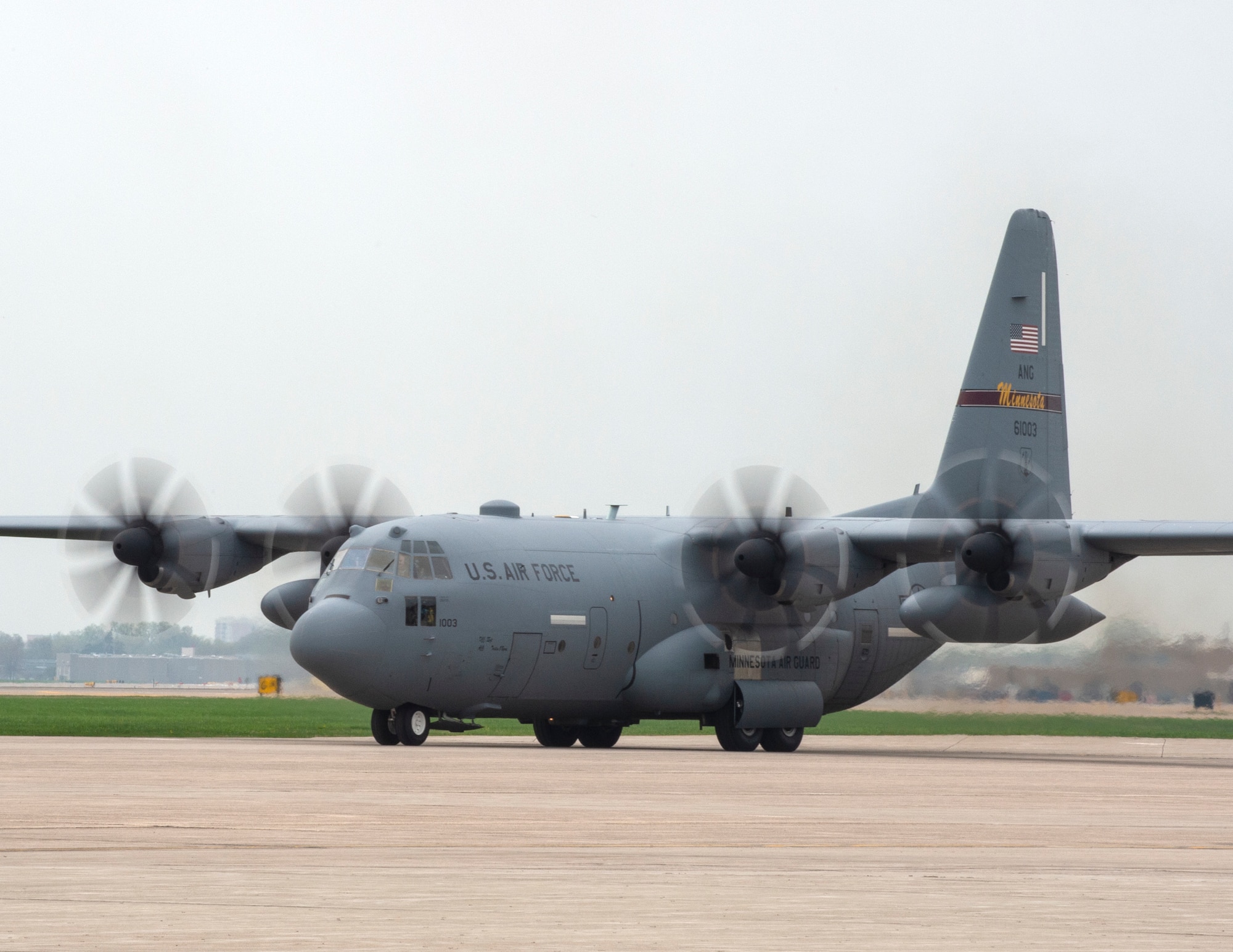 A C-130 Hercules from the 133rd Airlift Wing taxis to a parking spot on the flight line in St. Paul, Minn., May 11, 2022.