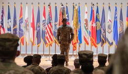 CSM Albert E. Richardson stands before new unit