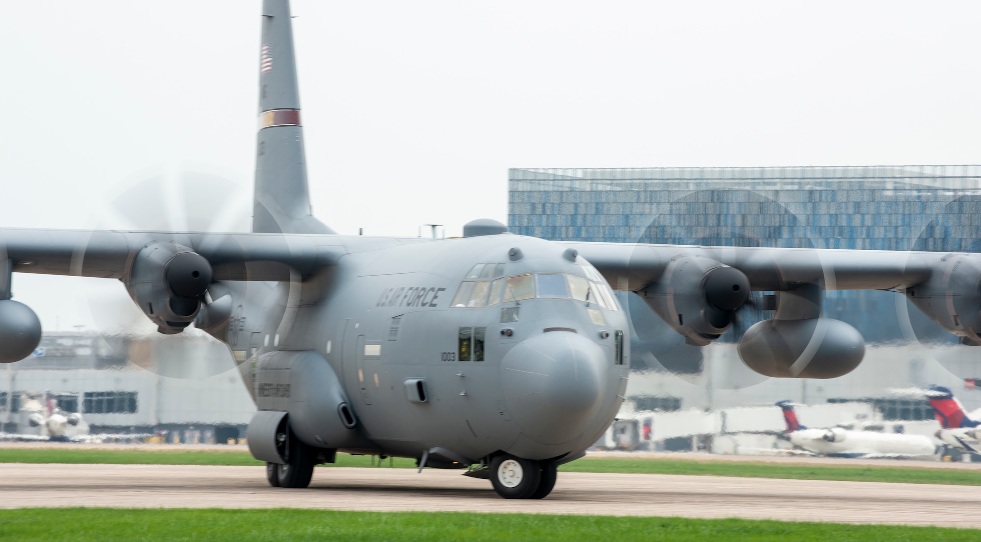 A C-130 Hercules from the 133rd Airlift Wing taxis to a parking spot on the flight line in St. Paul, Minn., May 11, 2022.