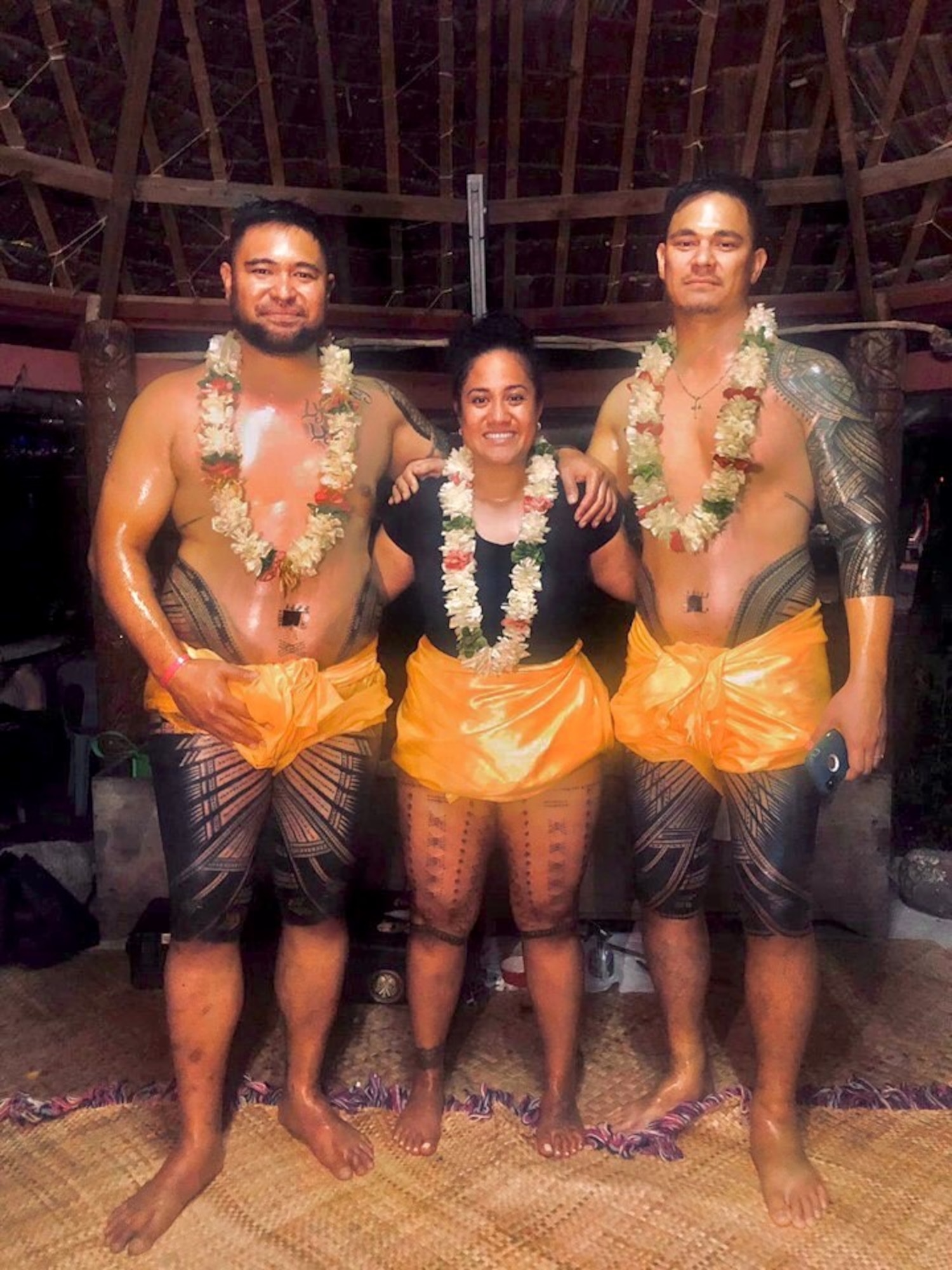 U.S. Air Force Master Sgt. Gloria Florentine Siliako-Nautu, and her fiancé and his brother after getting their traditional tattoo. Siliako-Nautu is assigned to the 17th Security Forces Squadron and where she is noncommissioned officer in charge of operations at Goodfellow Air Force Base, Texas. (courtesy photo)