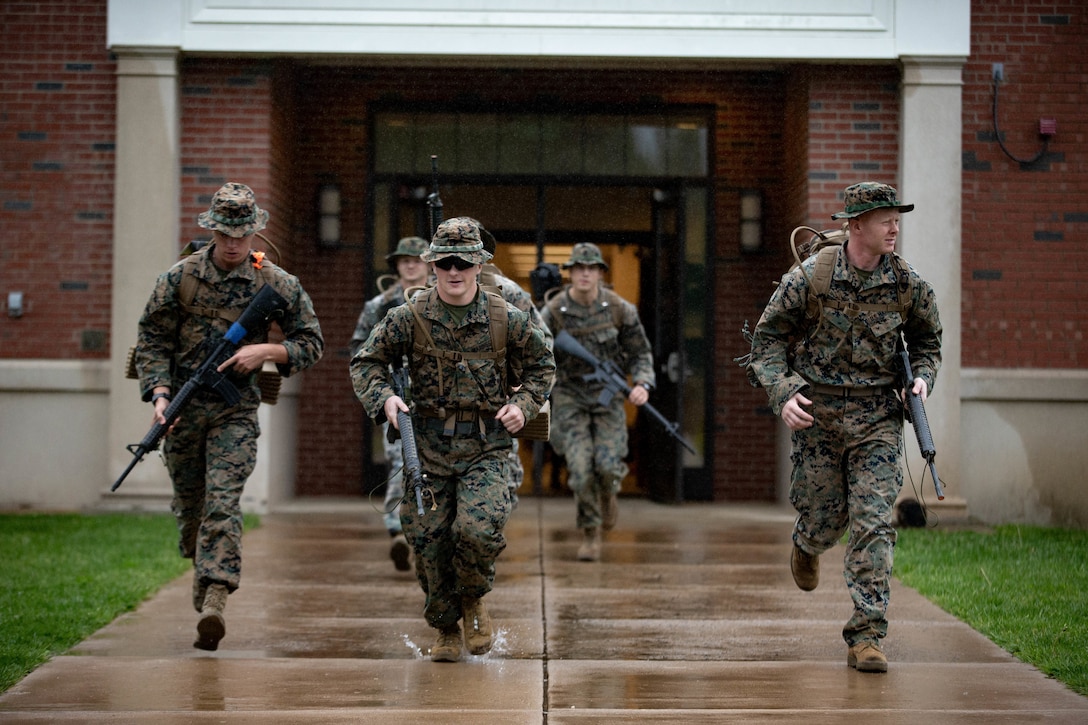 U.S. Marines and Sailors compete in the 2022 Iron Mike Challenge at The Basic School on Marine Corps Base Quantico, Virginia, May 7, 2022. Competitors from across the Marine Corps covered a distance of 20 miles, completing multiple physical and core skills challenges along the way.