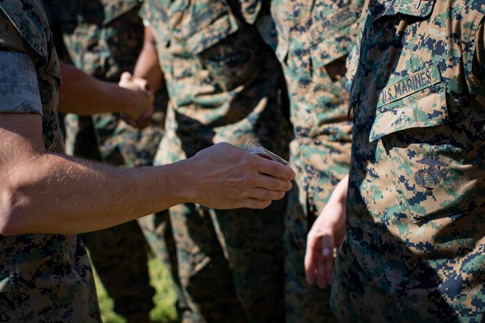 Lt. Col. Jeremy Nelson and 1st Sgt. Byron Pelaez conducting a Special Liberty Safety Brief prior to the Easter Holiday for the Entry Level student of Personnel Administration School, Marine Corps Combat Service Support Schools, Camp Johnson, North Carolina.