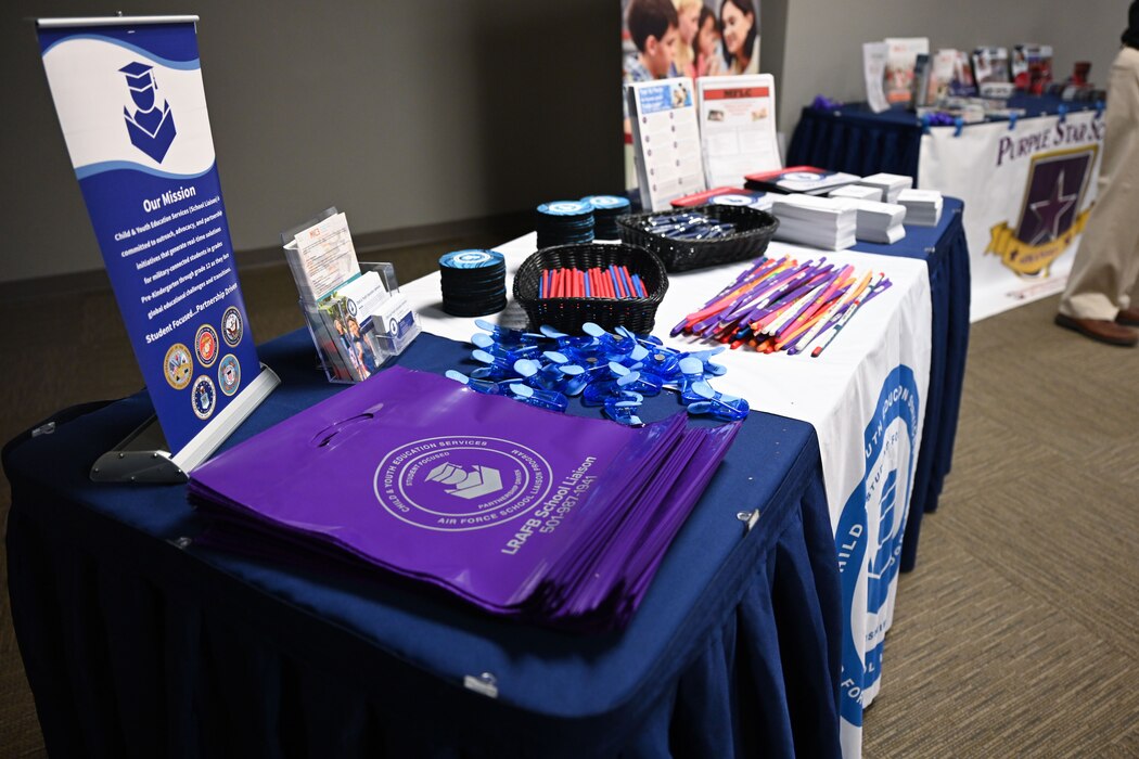Resources from the Little Rock AFB School Liaison Program are on display during an educator event
