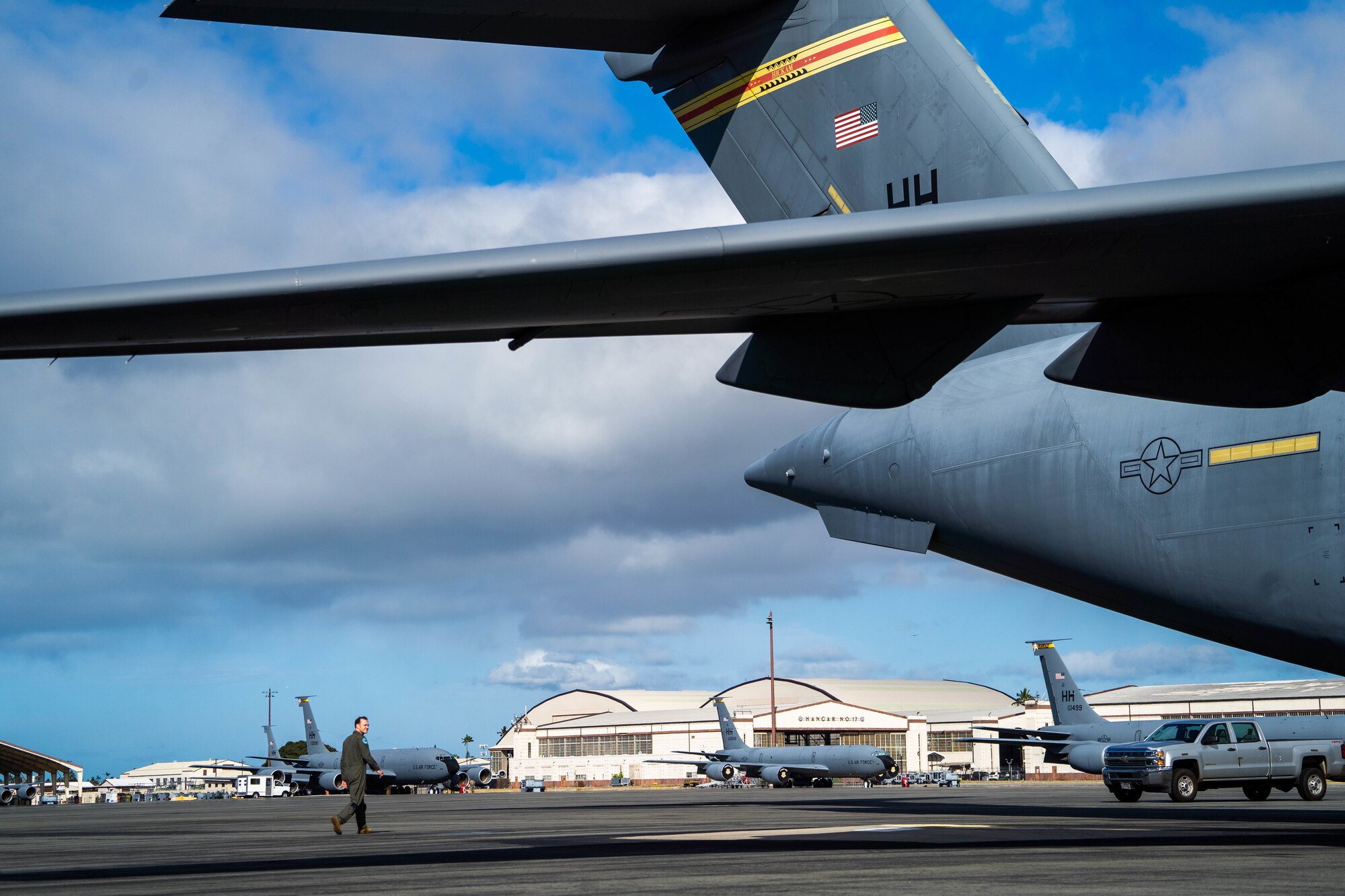 U.S. Air Force Maj. Joshua Moore, 535th Airlift Squadron pilot, performs a pre-flight inspection around the exterior of a C-17 Globemaster III before takeoff during Exercise Global Dexterity 2022 at Joint Base Pearl Harbor-Hickam, Hawaii, May 4, 2022. Exercise Global Dexterity is designed to prepare the U.S. Air Force and the Royal Australian Air Force for combined action in wartime, peacetime, and humanitarian operations throughout the Indo-Pacific. (U.S. Air Force photo by Airman 1st Class Makensie Cooper)