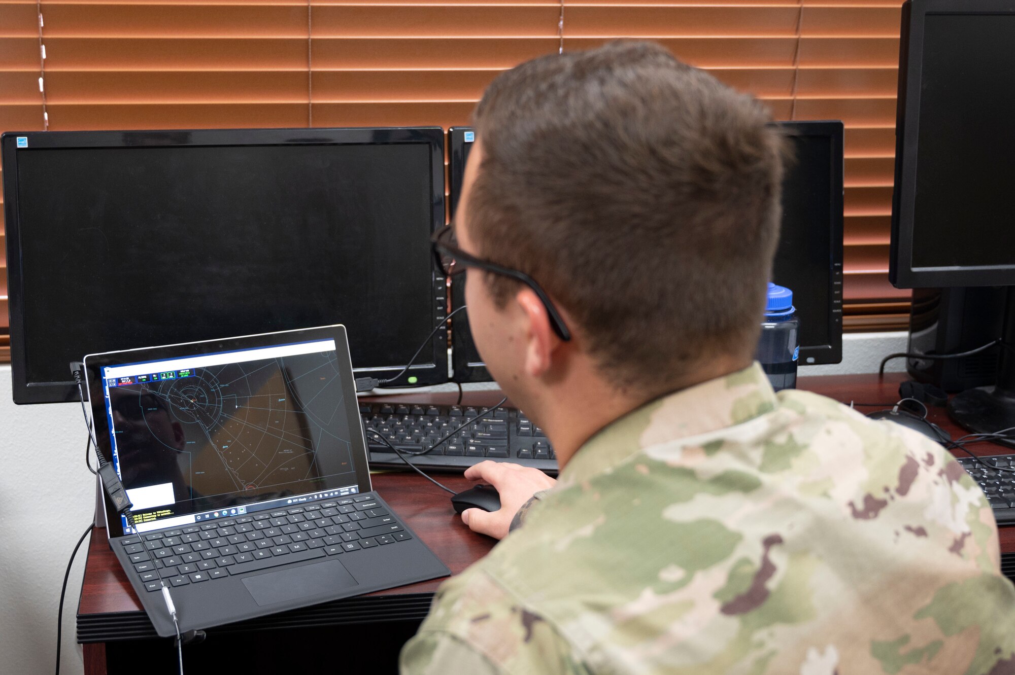 U.S. Air Force Senior Airman Daenon Davy, 47th Operations Support Squadron air traffic controller, runs an air traffic control simulator for practice at Laughlin Air Force Base, Texas, May 4, 2022. The simulator allows Airmen to train for day-to-day air traffic scenarios without the stress of real-world situations. (U.S. Air Force photo by Airman 1st Class Kailee Reynolds)
