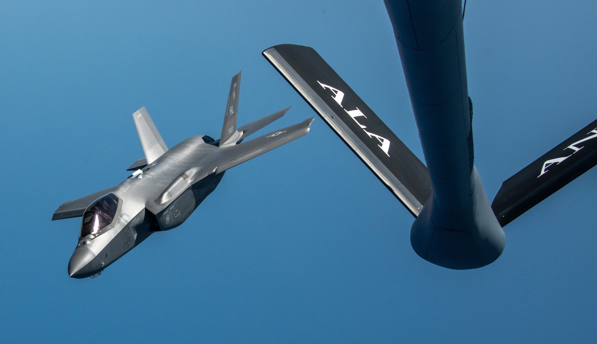 An F-35A Lightning II from the 419th Fighter Wing at Hill Air Force Base, Utah receives fuel from a KC-135 Stratotanker assigned to the 117th Air Refueling Wing, Alabama Air National Guard, over the Georgia coast