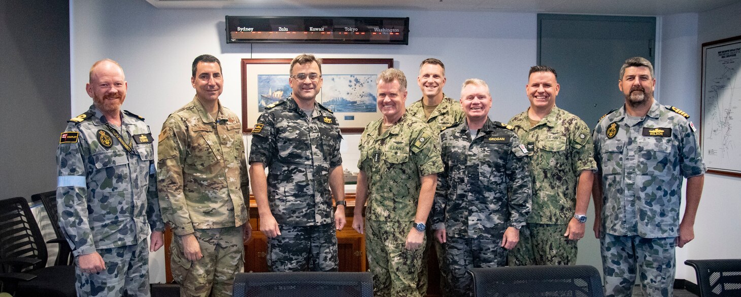 Adm. Samuel Paparo, Commander, U.S. Pacific Fleet, poses for a  photo with Royal Australian Navy Commodore Jonathan Earley and staff.