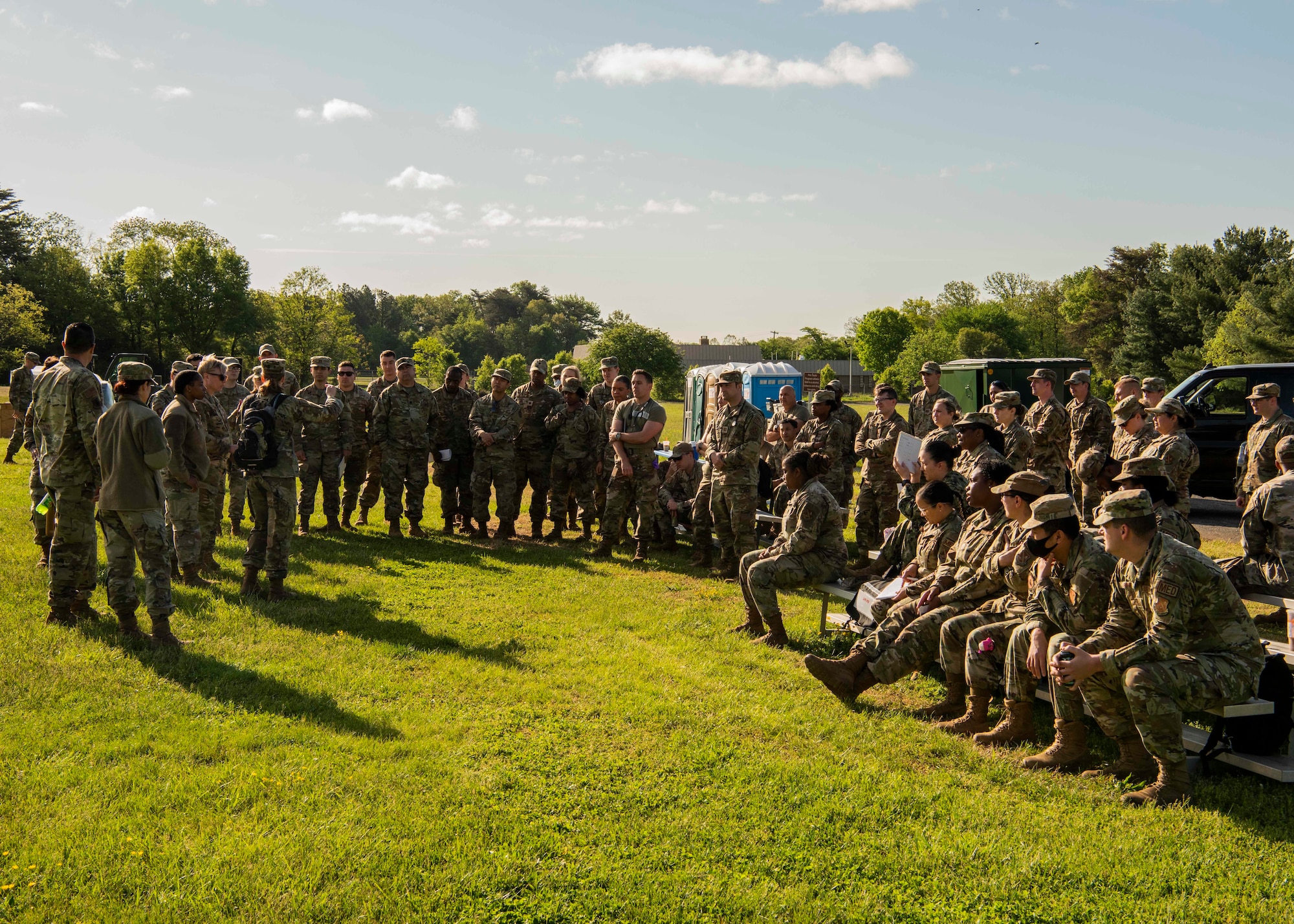 Military medical personnel gather before they begin the Expeditionary Medical Support System exercise at Joint Base Andrews, Md., May 5, 2022.