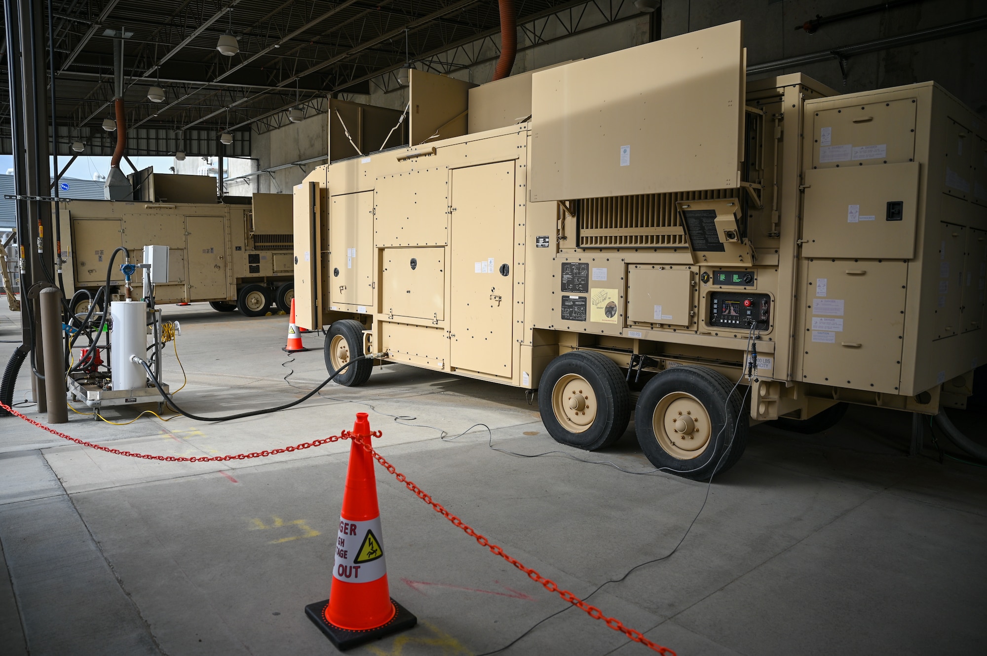 A Base Expeditionary Airfield Resources (BEAR) Power Unit undergoes validation and verification testing at Hill Air Force Base, Utah, April 26, 2022. The 526th EMXS activated a new maintenance workload on BEAR units after successfully testing the unit's first repaired asset. BEAR power units are used to power U.S. Air Force forward operating bases. (U.S. Air Force photo by R. Nial Bradshaw)