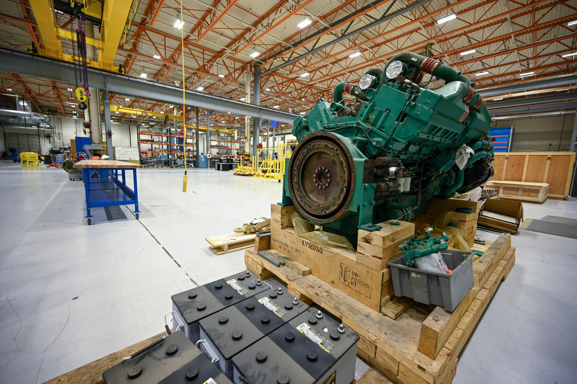 The engine from a Base Expeditionary Airfield Resources (BEAR) power unit sits inside a newly designed work space at Hill Air Force Base, Utah, April 26, 2022. The 526th EMXS activated a new maintenance workload on BEAR units after successfully testing the unit's first repaired asset. BEAR power units are used to power U.S. Air Force forward operating bases. (U.S. Air Force photo by R. Nial Bradshaw)