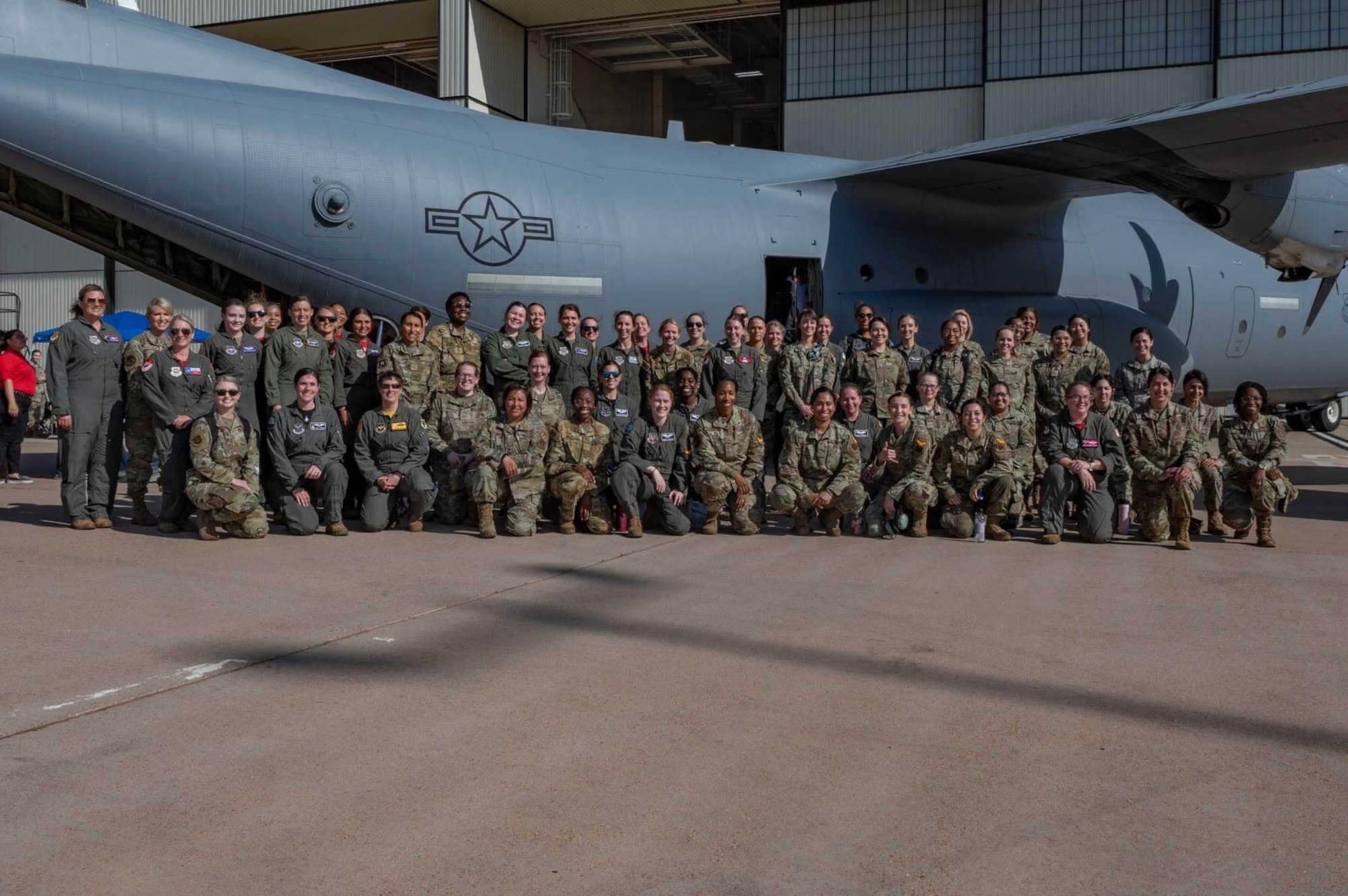 Participants in the Dyess Air Force Base, Texas, Women’s Summit pose for a photo in front of a Lockheed Martin C-130J Super Hercules, April 28, 2022. More than 100 women participated in the event to celebrate the 80th anniversary of the Women Air Force Service Pilots. (Courtesy photo)