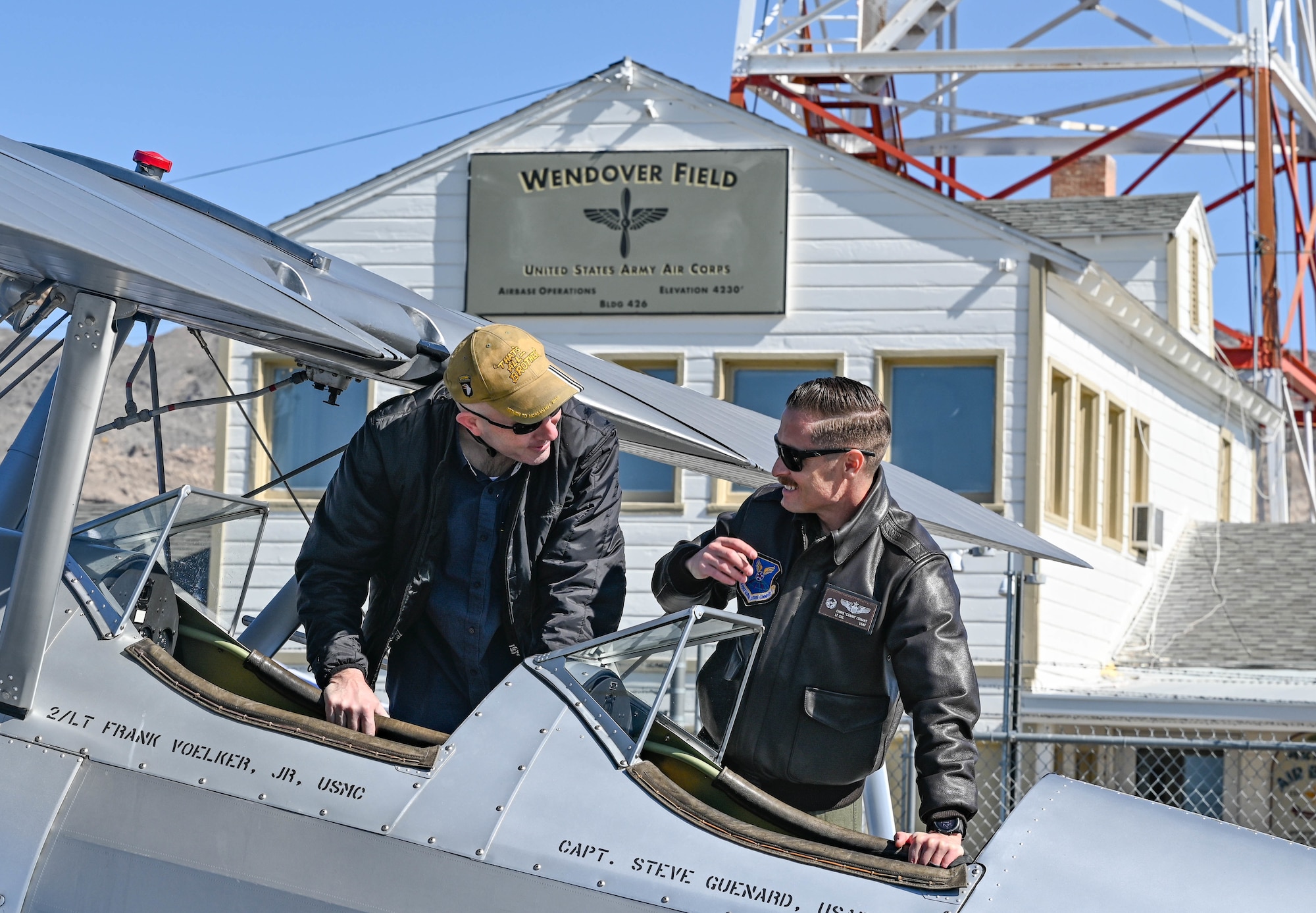 U.S. Air Force Lt. Col. Christopher Conant, 393rd Bomb Squadron commander, observes a PT-13 Kaydet at Wendover Airfield, Utah, May 10, 2022. The Kaydet was used as a primary trainer aircraft during the 1930s and 1940s.