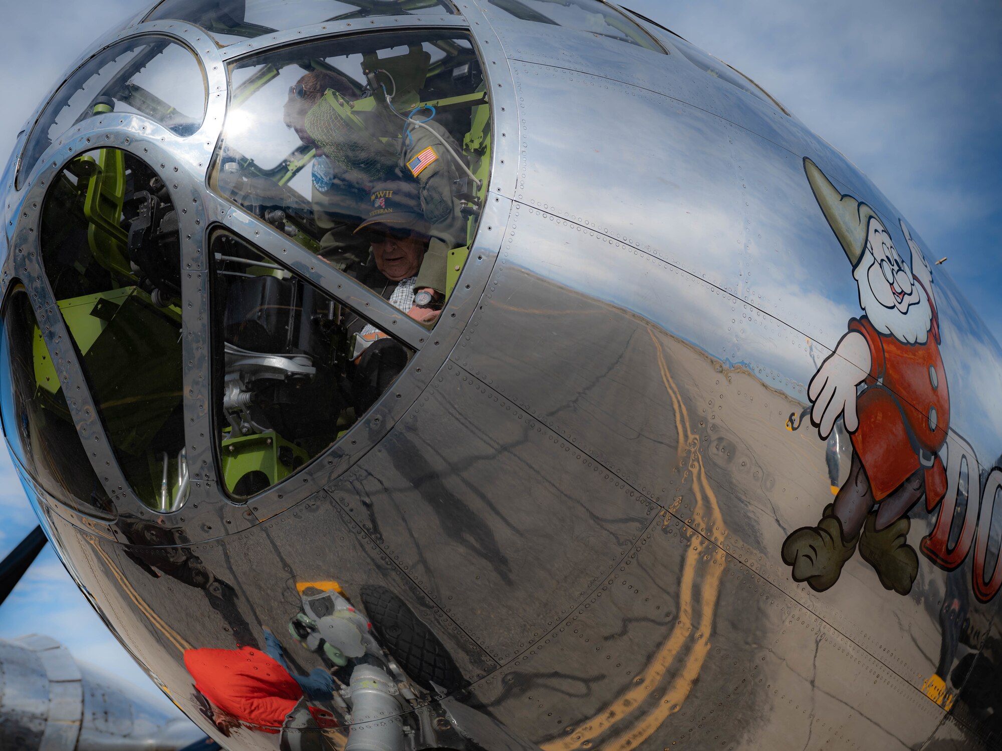 Norris Jernigan, a veteran of the original 509th Composite Group, buckles into a retired U.S. Army Air Force B-29 Superfortress, now knowns as "Doc," at Wendover Airfield, Utah, May 9, 2022.  Doc’s Friends manages the operations of one of the only working original B-29 Superfortess’. The non-profit organization was invited to fly two original 509th Composite Group members on the B-29 to honor their service and contribution to the United States.