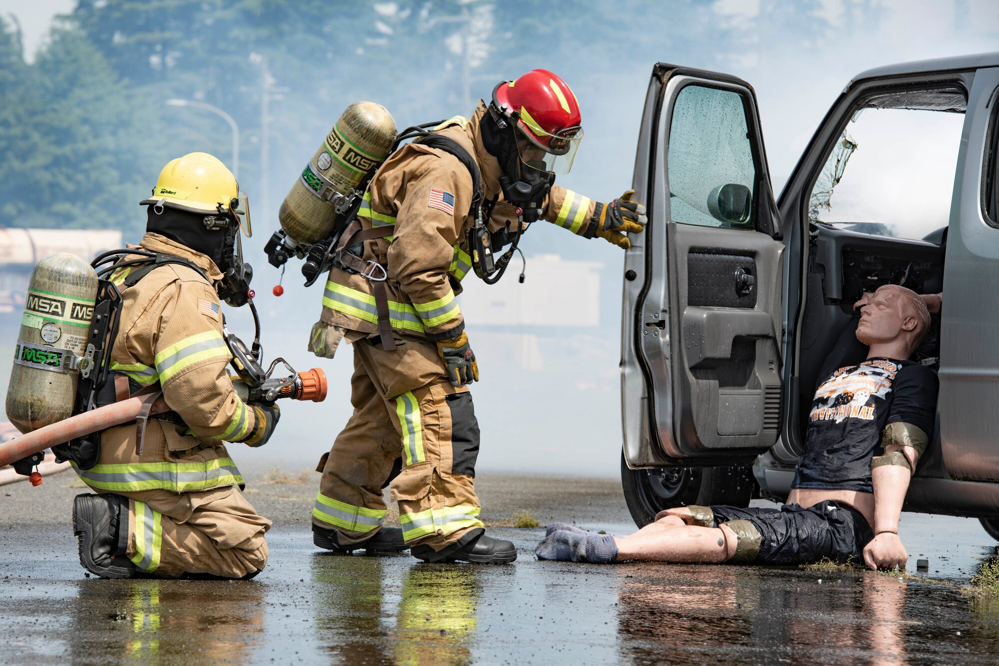 Firefighters with the 374th Civil Engineer Squadron Fire Department prepare to recover a simulated injured individual during a major accident response exercise at Yokota Air Base, Japan, May 11, 2022. The MARE tested the base’s response to a simulated F-16 Fighting Falcon crash and the ability to collaborate with mission partners. Due to the support of Naval Air Facility Atsugi, Commander Fleet Activities Yokosuka, Misawa Air Base and Tokyo Fire Department, Fussa Fire Station, this was the largest MARE in Yokota history. (U.S. Air Force photo by Machiko Arita)