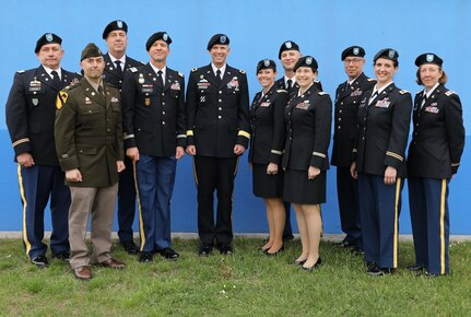 Maj. Gen. Jeff Broadwater poses with the staff of the 7th Intermediate Level Education Detachment, 7th Mission Support Command following a commencement ceremony for Intermediate Level Education – Common Core class of 2022 in Grafenwoehr, Germany, May 6, 2022.   

The 7th ILE Detachment is the only Command and General Staff College in the European theater and provides education for EUCOM, AFRICOM, and CENTCOM and is one of two training facilities to host international students.