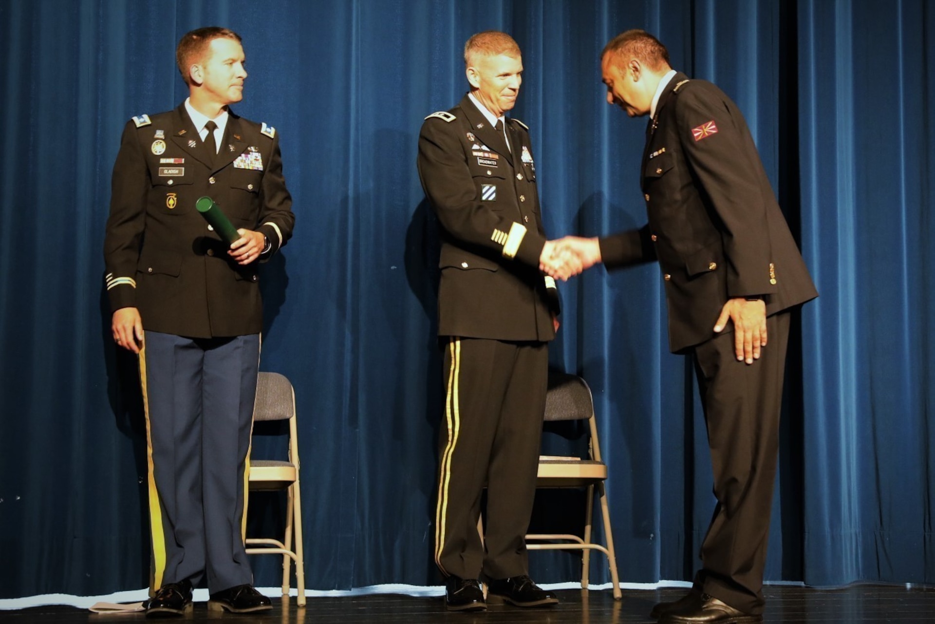 Maj. Gen. Jeff Broadwater, deputy commanding general of V Corps, congratulates an international student on their graduation from Intermediate Level Education – Common Core at the 7th Intermediate Level Education Detachment, 7th Mission support Command, in Grafenwoehr, May 6, 2022. 

The 7th ILE Detachment is the only Command and General Staff College in the European theater and provides education for EUCOM, AFRICOM, and CENTCOM and is one of two training facilities to host international students.