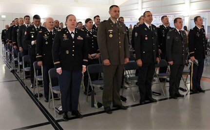 Students stand and sing The Army Song during the commencement ceremony for Intermediate Level Education – Common Core class of 2022 at the 7th Intermediate Level Education Detachment, 7th Mission Support Command, Grafenwoehr, Germany, May 6, 2022. 

The 7th ILE Detachment is the only Command and General Staff College in the European theater and provides education for EUCOM, AFRICOM, and CENTCOM and is one of two training facilities to host international students.