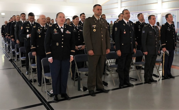 Students stand and sing The Army Song during the commencement ceremony for Intermediate Level Education – Common Core class of 2022 at the 7th Intermediate Level Education Detachment, 7th Mission Support Command, Grafenwoehr, Germany, May 6, 2022. 

The 7th ILE Detachment is the only Command and General Staff College in the European theater and provides education for EUCOM, AFRICOM, and CENTCOM and is one of two training facilities to host international students.