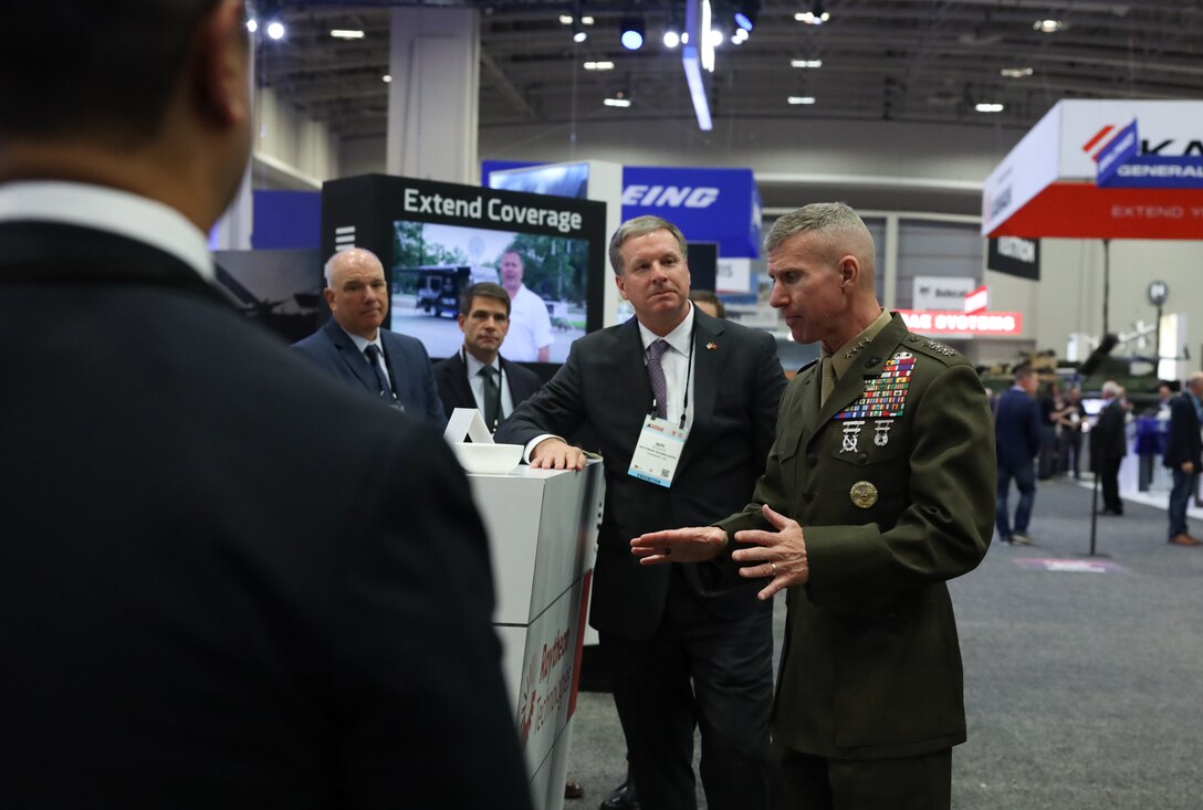 U.S. Marine Corps Gen. Eric M. Smith, the Assistant Commandant of the Marine Corps, meets with exhibitors at the Modern day Marine convention in Washington D.C., May 11, 2022. (U.S. Marine Corps photo by Cpl. Ellen Schaaf)