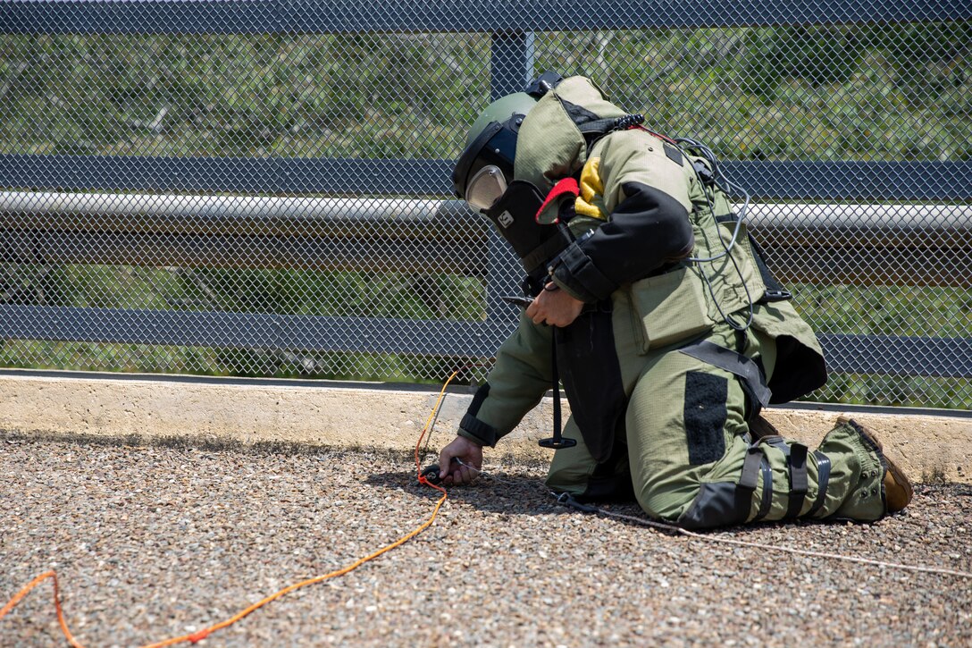 Sgt. Pedro Amador assigned to Location, Search, and Neutralization of Explosive Devices unit conducts coutner IED training during Exercise Tradewinds 2022, May 12, 2022.