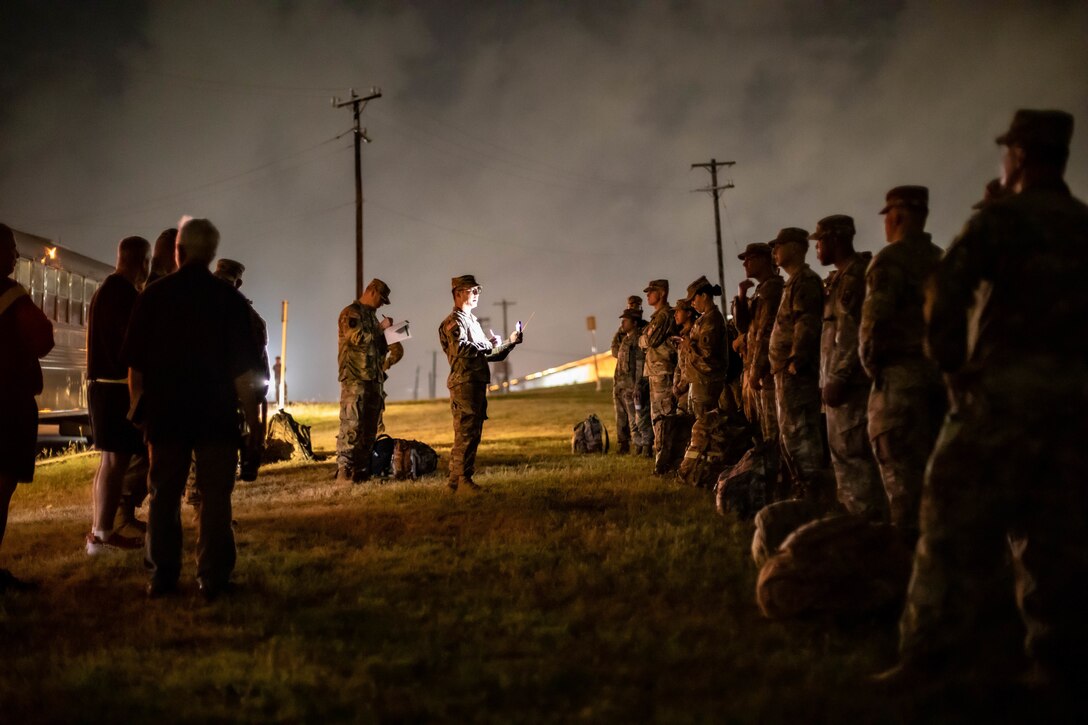 U.S. Army South Soldiers stand in formation for accountability beginning a contingency command post (CCP) deployment exercise on Fort Sam Houston, Texas, May 11, 2022. A CCP is a rapidly deployable headquarters capable of providing Joint Task Force support designed to plan and conduct small-scale contingency operations. (U.S. Army photo by Spc. Joshua Taeckens)