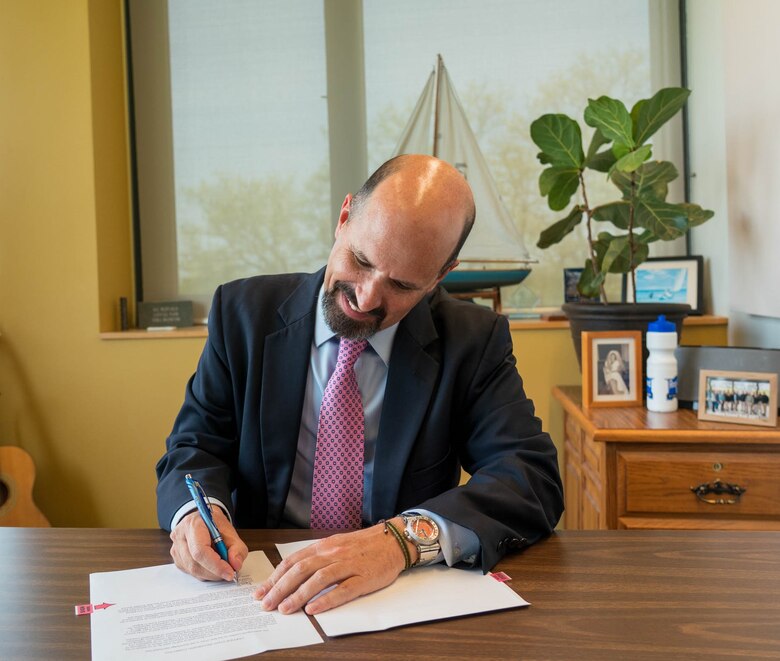 Dru Buntin, Director of the Missouri Dept. of Natural Resources signs an agreement with the Kansas City District, USACE, to begin aquatic restoration in the Osage River near Brockman Springs Road, Missouri, on May 6, 2022.