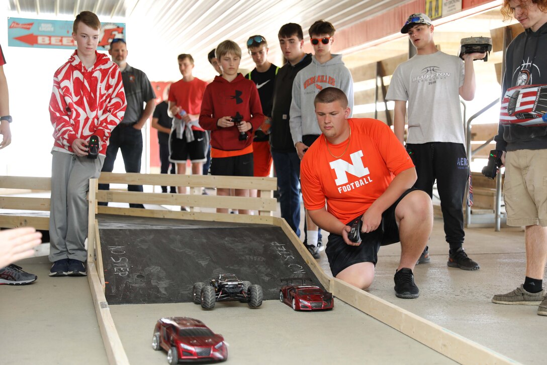 WRIGHT-PATTERSON AIR FORCE BASE (AFRL), Ohio – Students begin racing their RC cars during the Full Throttle STEM event May 10, 2022, at Eldora Speedway in Rossburg, Ohio. The Air Force Research Laboratory’s Gaming Research Integration for Learning Lab, or GRILL, hosted the science, technology, engineering and math events with 12 schools in attendance between both locations. (U.S. Air Force photo / Will Graver)