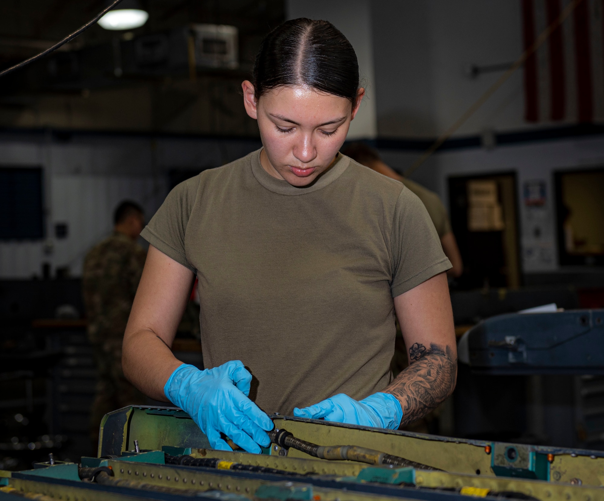 Senior Airman Megan Perkins, 4th Munitions Squadron armament maintenance member, assembles Adapter Unit-552 at Seymour Johnson Air Force base, North Carolina, May 12, 2022. Airmen provide reliable armament to ensure a positive connection between weaponry and the F-15E Strike Eagle aircraft. (U.S. Air Force photo by Airman 1st Class Sabrina Fuller)