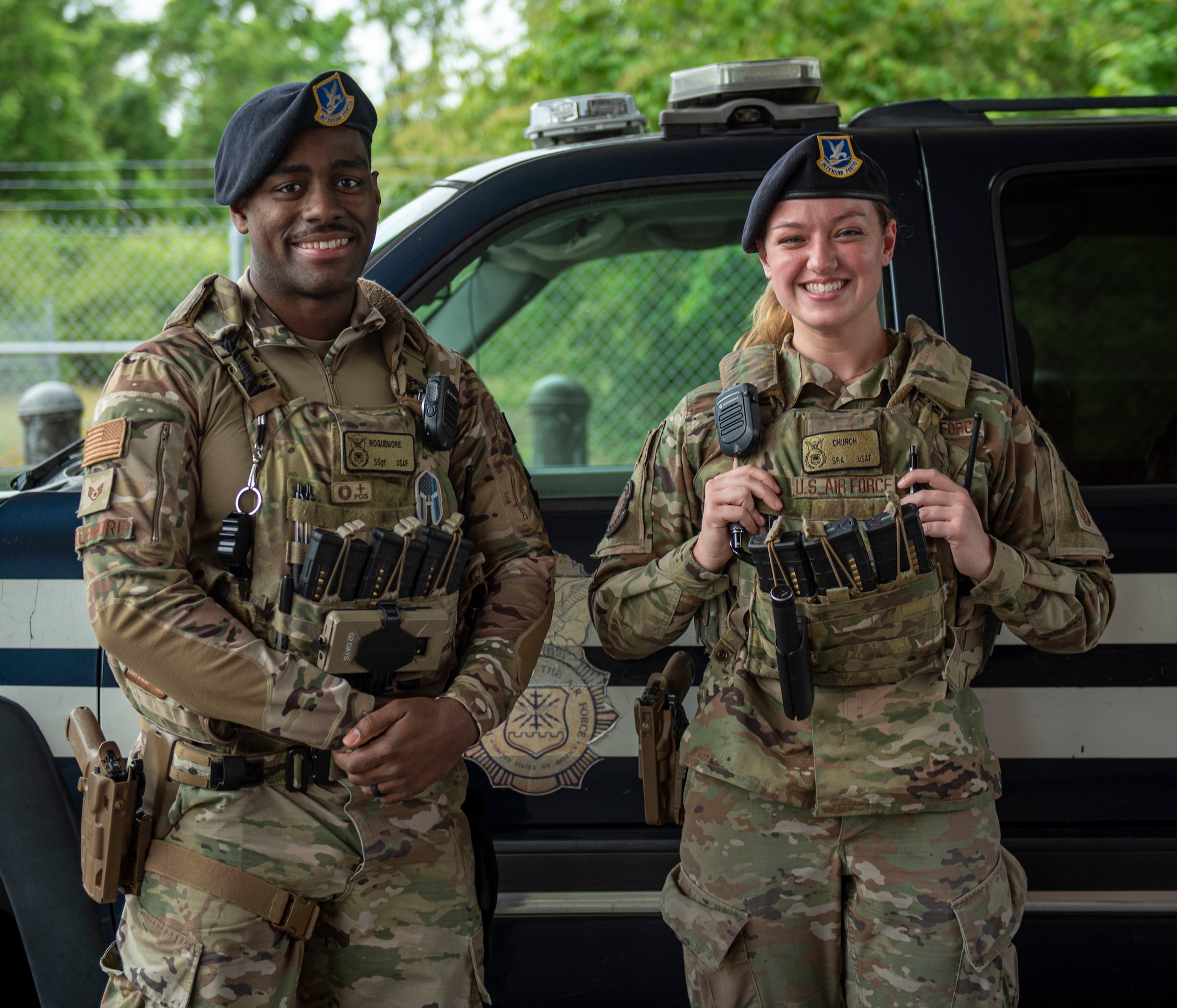 Staff Sgt. Marquez Roquemore, 4th Security Force Squadron patrolman, and Senior Airman Leighanna Church, 4th SFS desk sergeant, enforce security at an entry control point at Seymour Johnson Air Force Base, North Carolina, May 12, 2022. The 4th SFS is recognizing all law enforcement who are currently serving or gave their life on the line of duty during National Police Week. (U.S. Air Force photo by Airman 1st Class Sabrina Fuller)