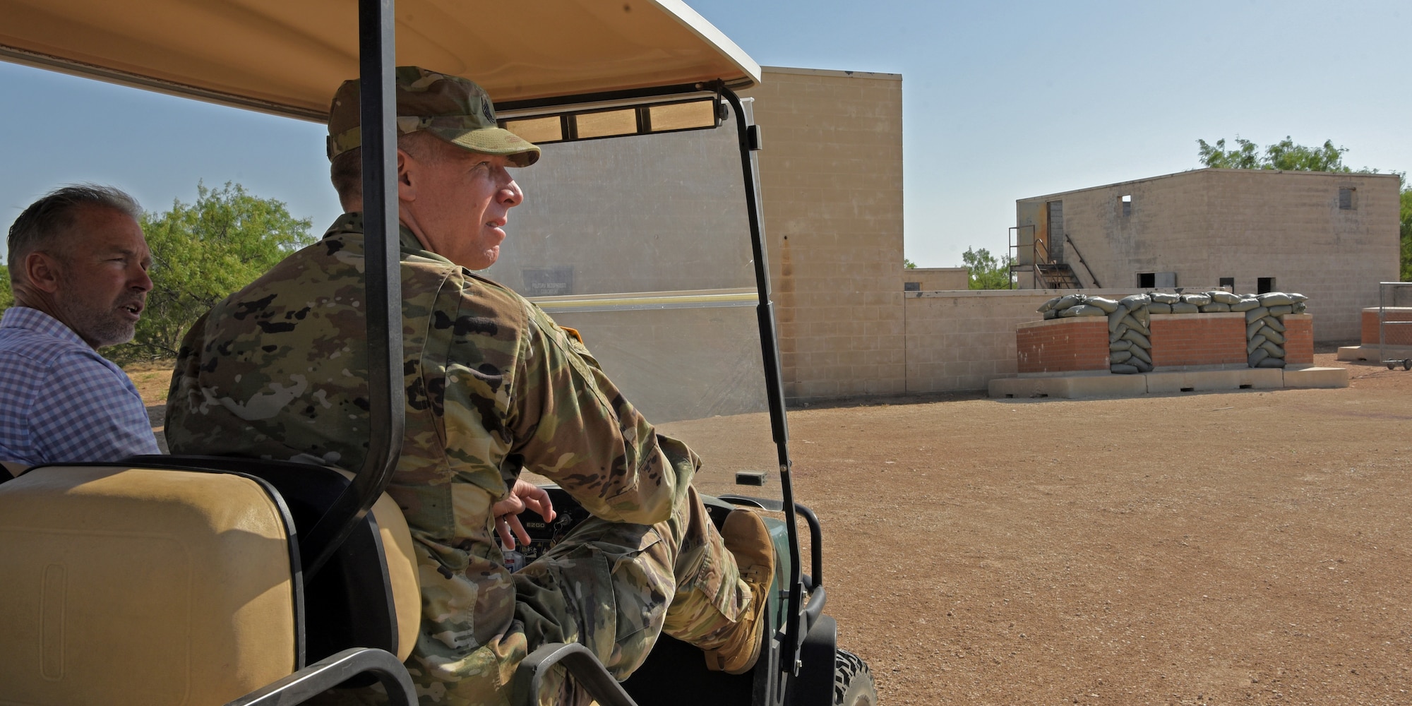 U.S. Army Command Sgt. Maj. Thomas Baird, National Geospatial-intelligence Agency command senior enlisted leader, travels through Forward Operating Base Sentinel, Goodfellow Air Force Base, Texas, May 12, 2022. Baird observed the 17th Training Wing’s current intelligence curriculum, discussed the existing plan of instructions, and brainstormed any challenges that cause training gaps between student’s initial skills training and the operational environment. (U.S. Air Force photo by Senior Airman Abbey Rieves)