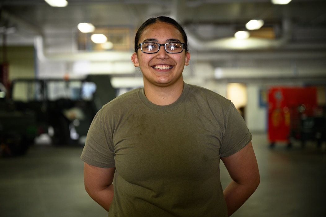 U.S. Air Force Airman 1st Class Azure Agricula-McCormick, a 354th Logistics Readiness Squadron vehicle maintenance journeyman, poses for a photo during RED FLAG-Alaska 22-1 on Eielson Air Force Base, Alaska, May 11, 2022.