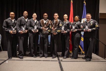 The nominees and winners of the 2021 Fleet Forces Command Sea and Shore Sailor of the Year pose for a photo following a ceremony at the Sheraton hotel in Norfolk, May 13, 2022.