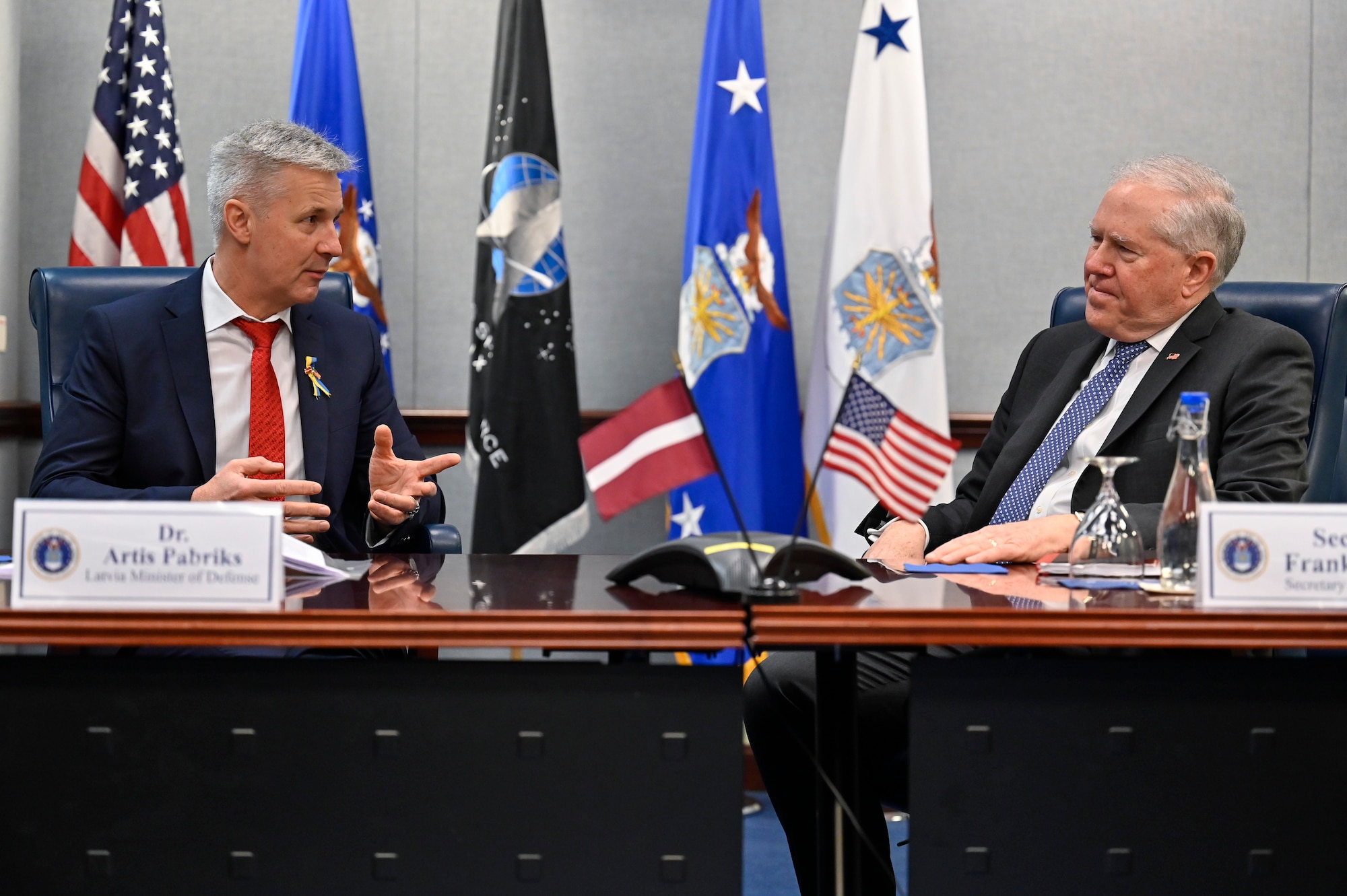 Dr. Artis Pabriks, minister of defense and deputy prime minister of Latvia, speaks with Secretary of the Air Force Frank Kendall during a meeting.