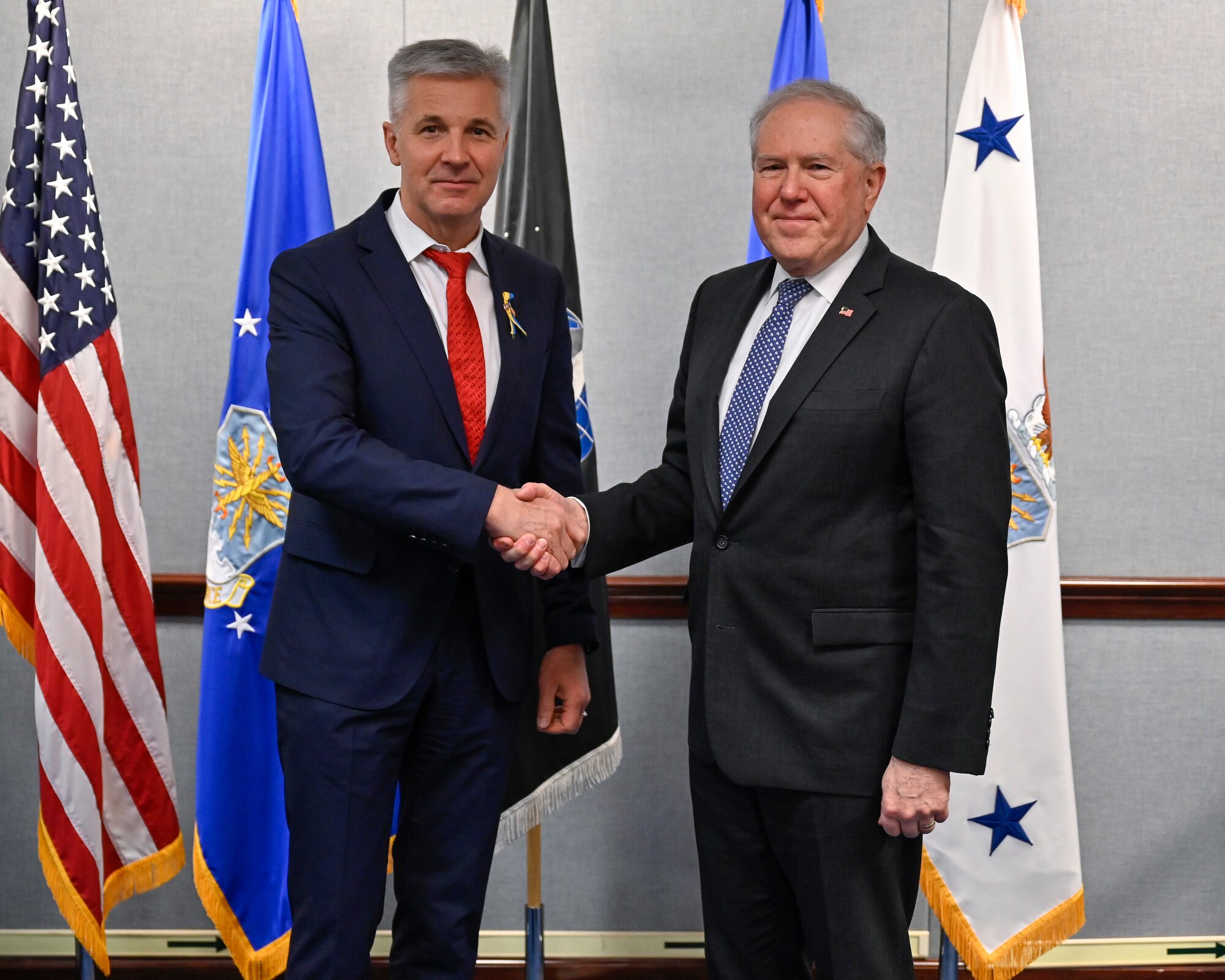 Dr. Artis Pabriks, left, minister of defense and deputy prime minister of Latvia, poses with Secretary of the Air Force Frank Kendall.