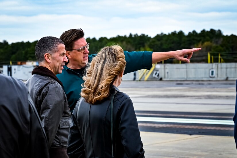 U.S. Navy Vice Adm. Carl Chebi, Naval Air Systems Command, commander, speaks with Naval Air Warfare Center Aircraft Division leadership at the electromagnetic aircraft launcher system testing site on May 11, 2022, on Joint Base McGuire-Dix-Lakehurst, N.J. NAVAIR's mission is to provide full life-cycle support of naval aviation aircraft, weapons and systems operated by Sailors and Marines. This support includes research, design, development and systems engineering; acquisition; test and evaluation; training facilities and equipment; repair and modification; and in-service engineering and logistics support.
