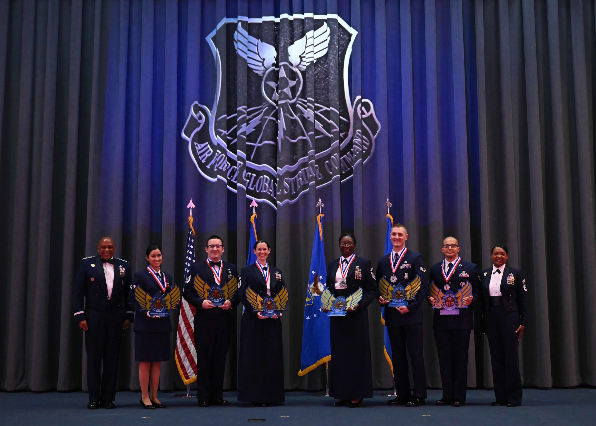 Recipients of Air Force Global Strike Command’s Outstanding Airmen of the Year awards stand with Gen. Anthony Cotton, AFGSC commander and Chief Master Sgt. Melvina Smith, AFGSC command chief. Six AFGSC Airmen were selected for this prestigious award on the basis of merit, job performance, superior leadership and personal achievements. (U.S. Air Force photo by Senior Airman Caleb S. Kimmell)