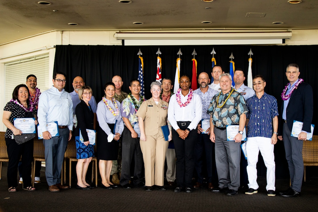 Winners of the Federal Leader, Supervisor, and Manager of the Year category pose for a photo during the 66th Annual Excellence in Federal Government Awards Ceremony, Hickam Officers’ Club, Joint Base Pearl Harbor-Hickam, May 6, 2022. The purpose of the ceremony was to acknowledge the hard work of U.S. service members and civilians across the federal government. (U.S. Marine Corps photo by Cpl. Samantha Sanchez)