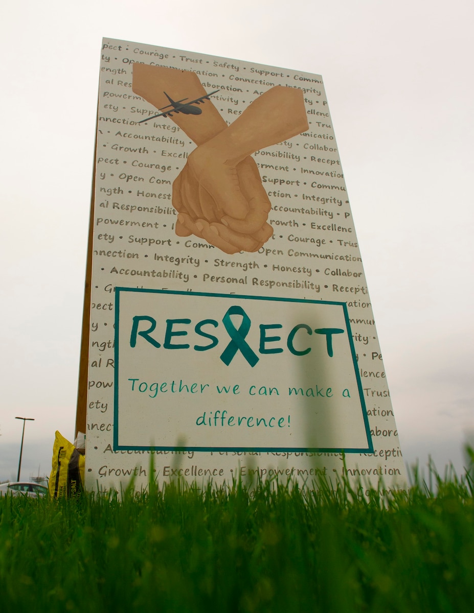 A Sexual Assault Awareness Month sign, located near the 934th Airlift Wing’s main gate, at the Minneapolis-Saint Paul Air Reserve Station, March 24, 2022. Elizabeth Swanson, the 934 AW Sexual Assault Response Coordinator, designed and painted the mural to focus on education and bring attention to sexual assault during the month of April. (U.S. Air Force photo by Chris Farley)