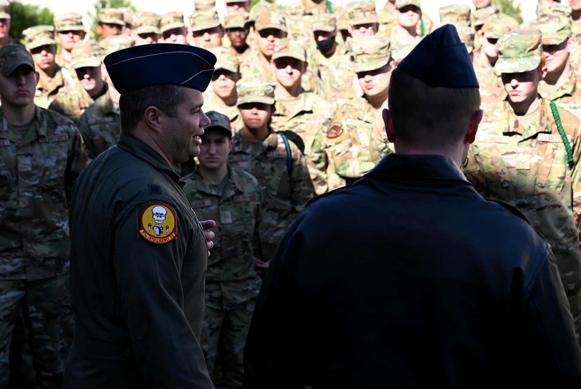 U.S. Air Force airborne cryptologic language analyst students assigned to the 517th Training Group gather to speak with Lt. Col. James Ruby, 97th Intelligence Squadron commander, and Chief Master Sgt. Thomas Vertner, 97th IS senior enlisted leader, at Presidio of Monterey, Calif., May 11, 2022. More than 20 operational commanders, senior enlisted leaders, functional managers and operational leaders gathered at the Defense Language Institute Foreign Language Center for the 517th Training Group’s VisitPalooza. VisitPalooza is an event hosted by the 517th TRG, allowing visitors the opportunity to get a glimpse of students' lives as they go through the strenuous curriculum. (U.S. Air Force photo by Master Sgt. Jocelyn A. Ford)