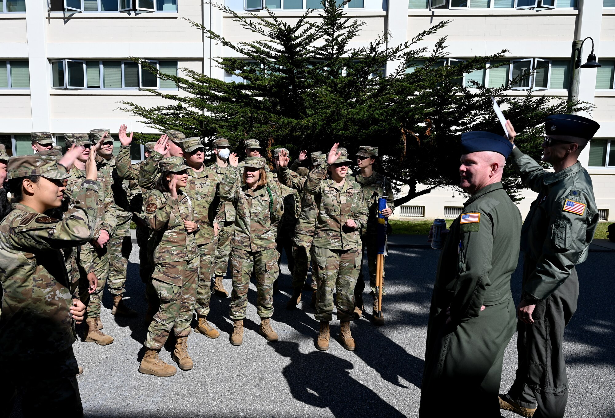 U.S. Air Force airborne cryptologic language analyst students assigned to the 517th Training Group gather to speak with Lt. Col. Matthew Weilbacher, 488th Intelligence Squadron director of operations and Chief Master Sgt. Chet Cooper, 488th IS senior enlisted leader, at Presidio of Monterey, Calif., May 11, 2022. More than 20 operational commanders, senior enlisted leaders, functional managers and operational leaders gathered at the Defense Language Institute Foreign Language Center for the 517th Training Group’s VisitPalooza. VisitPalooza is an event hosted by the 517th TRG, allowing visitors the opportunity to get a glimpse of students' lives as they go through the strenuous curriculum. (U.S. Air Force photo by Master Sgt. Jocelyn A. Ford)