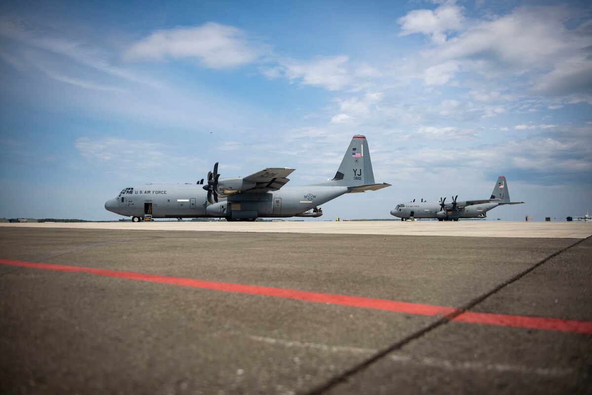 U.S. Air Force C-130J Super Hercules assigned to the 36th Airlift Squadron sit on the flightline during exercise Beverly Sunrise 22-04 at Misawa Air Base, Japan, May 12, 2022. Agile Combat Employment is the result of the 2018 National Defense Strategy instructing services to alter their posture and transition from a large, centralized, unhardened infrastructure to smaller, dispersed, resilient, adaptive basing. (U.S. Air Force photo by Airman 1st Class Leon Redfern)