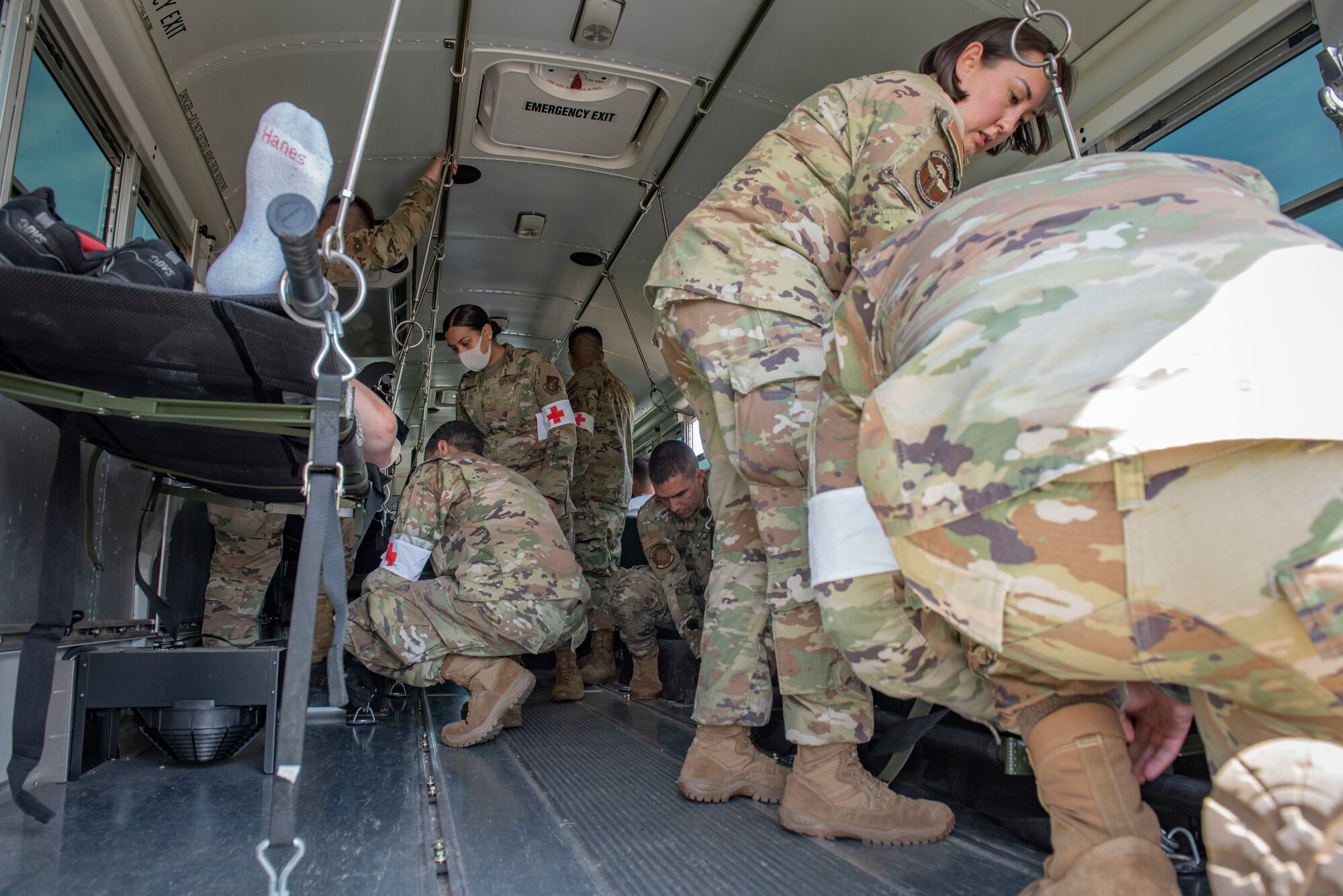 Members of the 374th Medical Group prepare to transport a simulated injured person during a major accident response exercise at Yokota Air Base, Japan, May 11, 2022. The MARE tested the base’s response to a simulated F-16 Fighting Falcon crash and the ability to collaborate with mission partners. Due to the support of Naval Air Facility Atsugi, Commander Fleet Activities Yokosuka, Misawa Air Base and Tokyo Fire Department, Fussa Fire Station, this was the largest MARE in Yokota history. (U.S. Air Force photo by Machiko Arita)