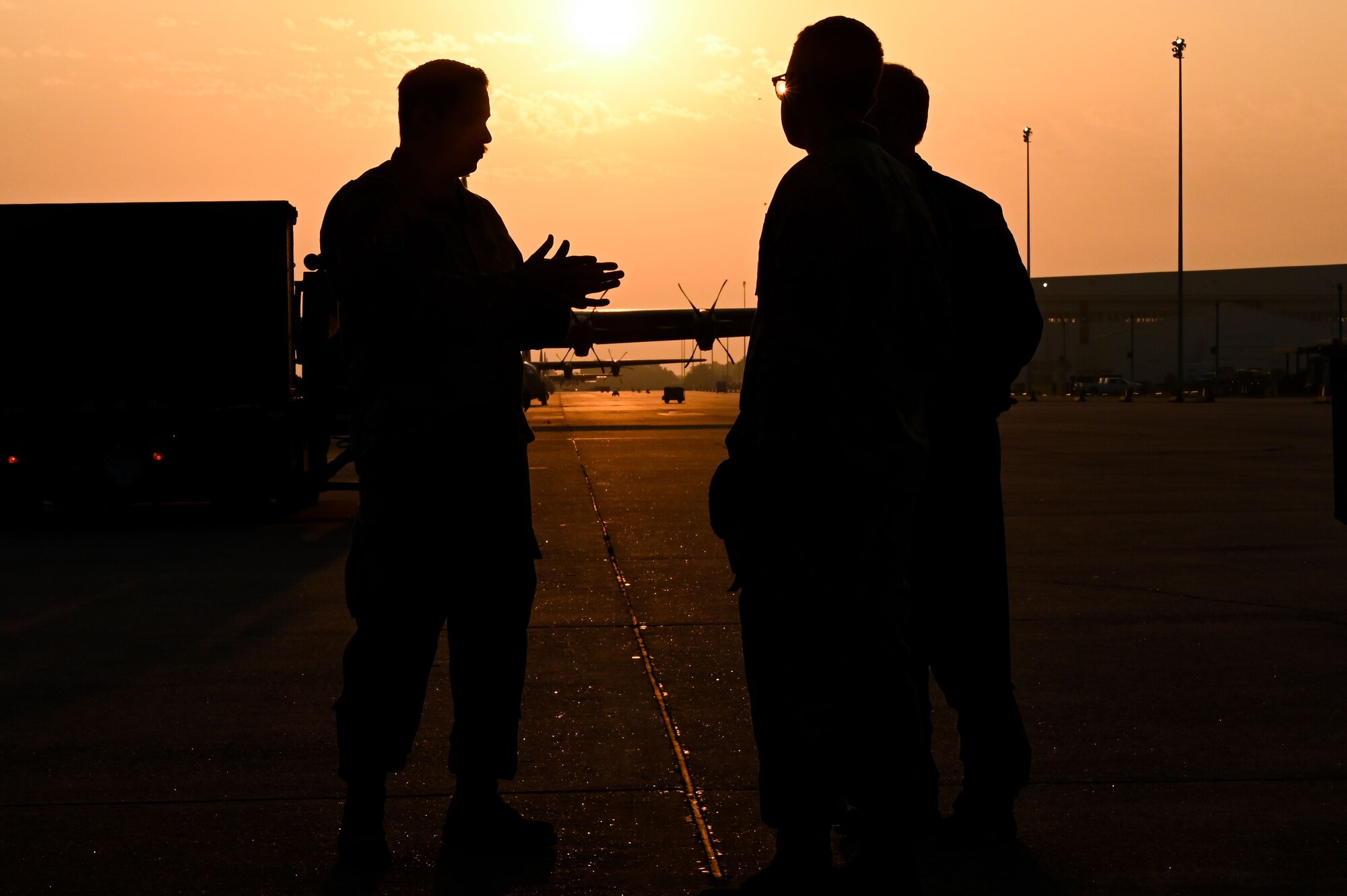 Airmen assigned to the 19th Airlift Wing discuss cargo loading operations during Phase 1 of ROCKI 22-03